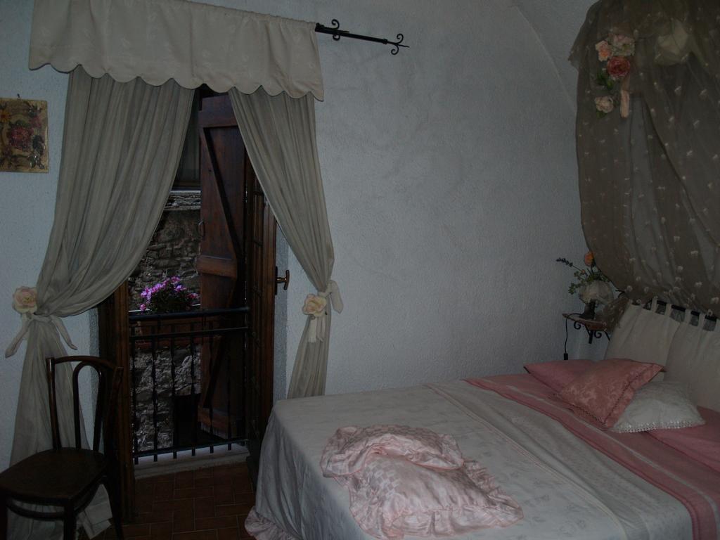 Bed and Breakfast Le Petit Chateau Дольчеаккуа Номер фото